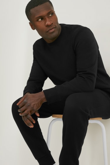 Hommes - Pantalon de jogging - noir