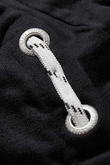 Reverskraag - Sweatvest met capuchon - zwart