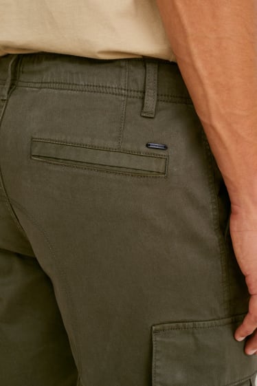 Mężczyźni - Spodnie bojówki - tapered fit - Flex - LYCRA® - ciemnozielony