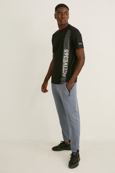 Hommes - Pantalon de jogging - gris chiné