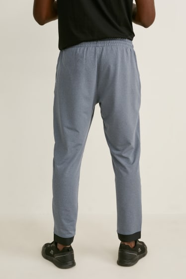 Pánské - Teplákové kalhoty - šedá-žíhaná