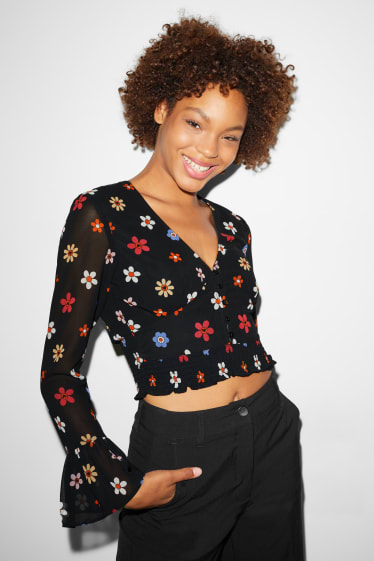 Clockhouse Girls - CLOCKHOUSE - blusa di chiffon dal taglio corto - a fiori - nero