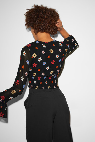 Clockhouse Girls - CLOCKHOUSE - blusa di chiffon dal taglio corto - a fiori - nero