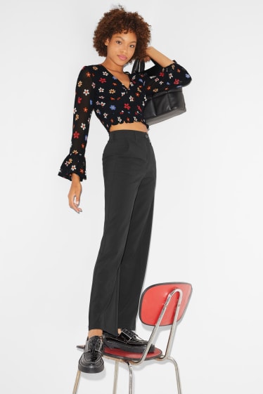 Clockhouse Girls - CLOCKHOUSE - blusa di chiffon dal taglio corto - a fiori - nero