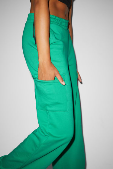 Exclusiv online - CLOCKHOUSE - pantaloni cargo din molton - talie medie - palazzo - verde