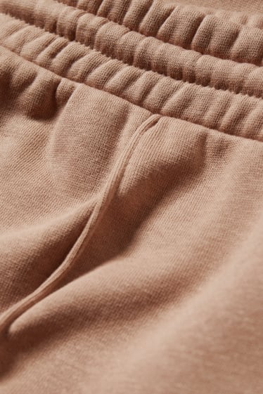 Clockhouse Girls - CLOCKHOUSE - pantaloni di felpa - palazzo - marrone chiaro
