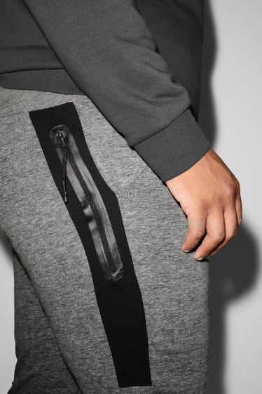 Exkluzivní online - CLOCKHOUSE - teplákové kalhoty - šedá