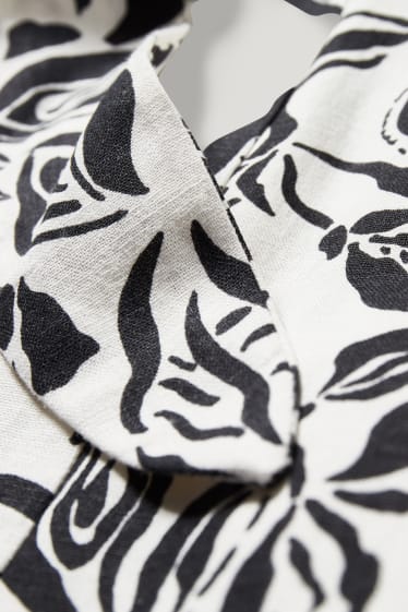 Dona - Vestit amb detall de nus - mescla de lli - de flors - negre/blanc