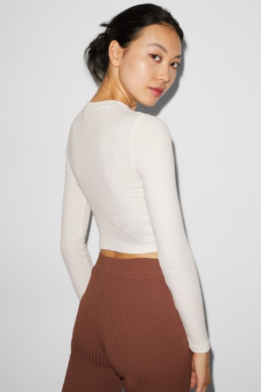 Exclusiu online - CLOCKHOUSE - samarreta crop de màniga llarga - blanc trencat