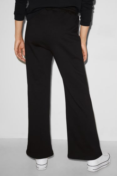 Clockhouse femme - CLOCKHOUSE- pantalon en molleton - palazzo - noir