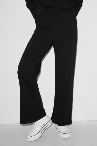 Clockhouse femme - CLOCKHOUSE- pantalon en molleton - palazzo - noir
