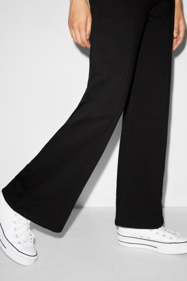 Clockhouse femme - CLOCKHOUSE- pantalon en molleton - palazzo - noir