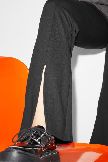Clockhouse Girls - CLOCKHOUSE - pantaloni di jersey - taglio flared - nero