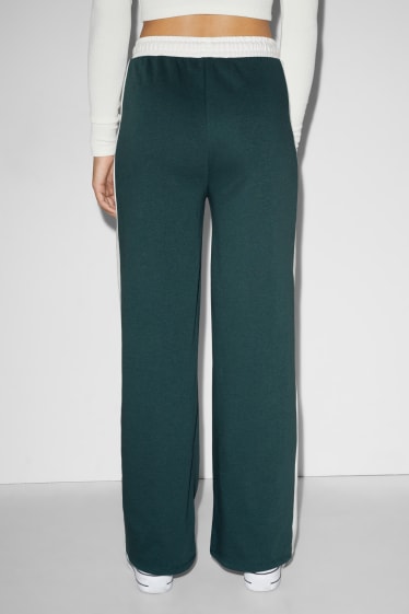 Exclusivo online - CLOCKHOUSE - pantalón de deporte - verde oscuro-jaspeado