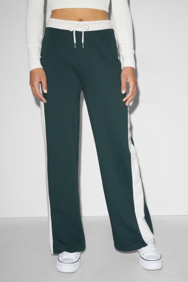 Exclusivo online - CLOCKHOUSE - pantalón de deporte - verde oscuro-jaspeado