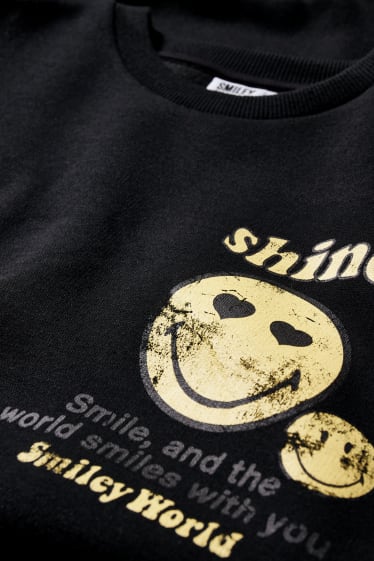 Exclu web - CLOCKHOUSE - robe en molleton - SmileyWorld® - noir