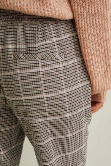Femmes - Pantalon en toile - mid waist - coupe fuselée - à carreaux - gris / beige