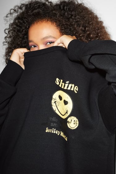 Exclu web - CLOCKHOUSE - robe en molleton - SmileyWorld® - noir