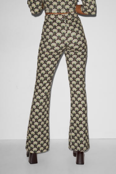 Exklusiv Online - CLOCKHOUSE - Jersey-Hose - Flared - geblümt - braun