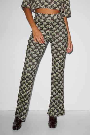 Exklusiv Online - CLOCKHOUSE - Jersey-Hose - Flared - geblümt - braun