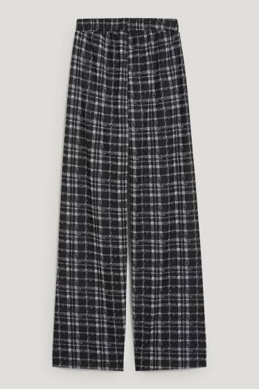 Exclusiv online - CLOCKHOUSE - pantaloni de stofă - talie medie - palazzo - în carouri - negru / alb