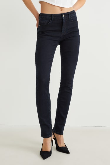 Dona - Slim jeans - mid waist - texans modeladors - LYCRA® - texà blau fosc