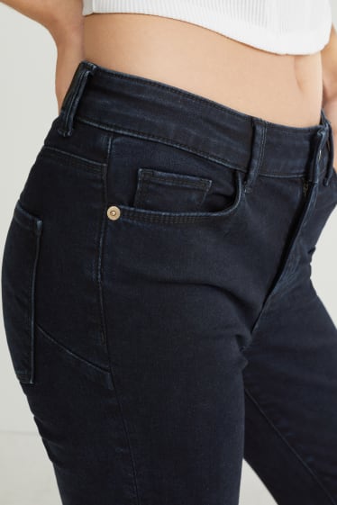 Dona - Slim jeans - mid waist - texans modeladors - LYCRA® - texà blau fosc
