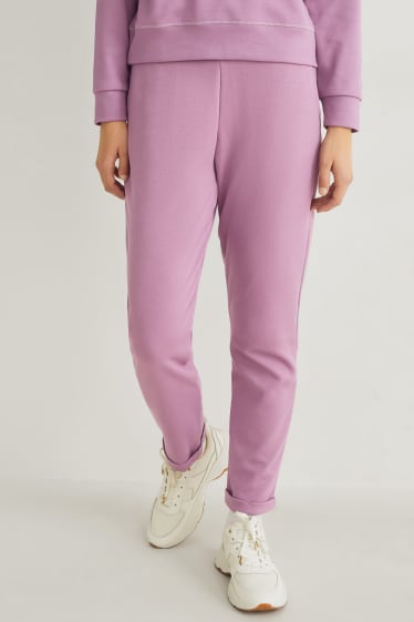 Dámské - Žerzejové kalhoty - skinny fit - fialová