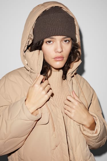 Exclu web - CLOCKHOUSE - doudoune à capuche - beige