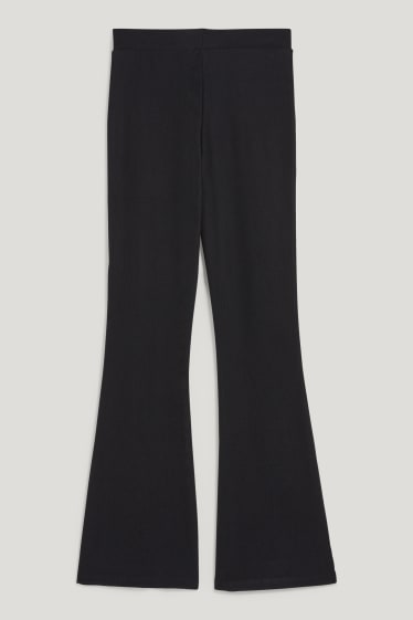 Clockhouse Girls - CLOCKHOUSE - jersey trousers - flared - black