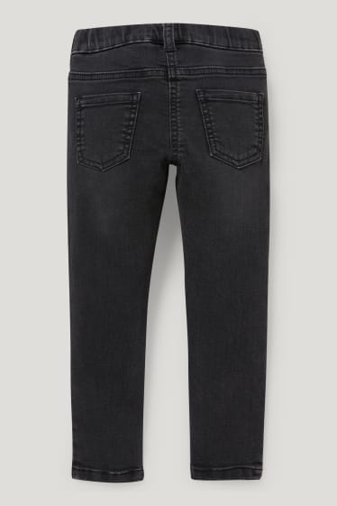 Niñas - Jegging jeans - brillos - negro