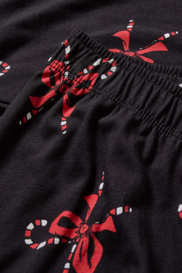 Clockhouse Girls - CLOCKHOUSE - spodnie od piżamy w bożonarodzeniowym stylu - Grinch - czarny
