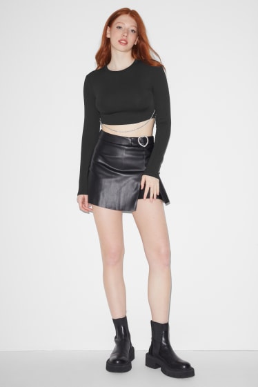 Exclusiu online - CLOCKHOUSE - samarreta crop de màniga llarga amb cadena - negre