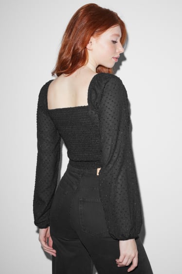 Esclusiva online - CLOCKHOUSE - blusa taglio corto - nero
