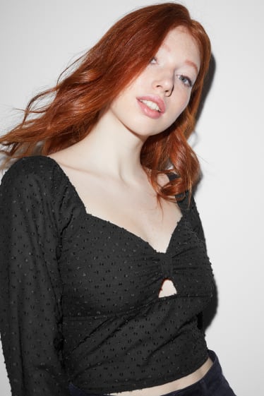 Esclusiva online - CLOCKHOUSE - blusa taglio corto - nero