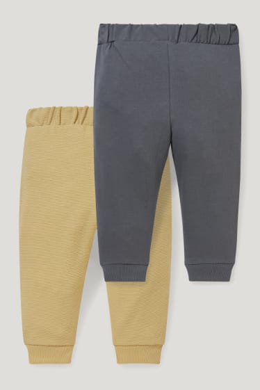 Miminka chlapci - Multipack 2 ks - teplákové kalhoty pro miminka - šedá