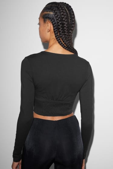 Exclusiu online - CLOCKHOUSE - samarreta de màniga llarga crop - negre