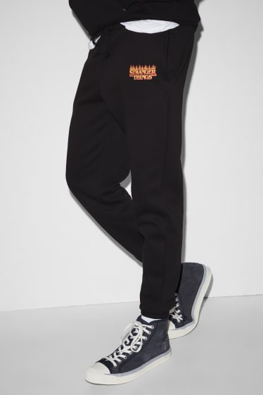 Clockhouse nen - CLOCKHOUSE - pantalons de xandall - Stranger Things - negre