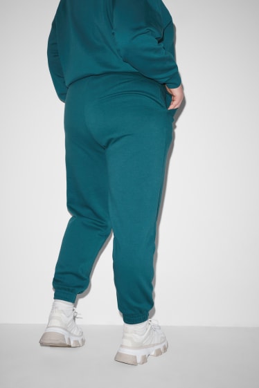 Femmes grandes tailles - CLOCKHOUSE - pantalon de jogging - vert foncé