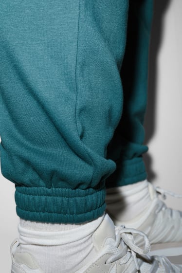 Femmes grandes tailles - CLOCKHOUSE - pantalon de jogging - vert foncé