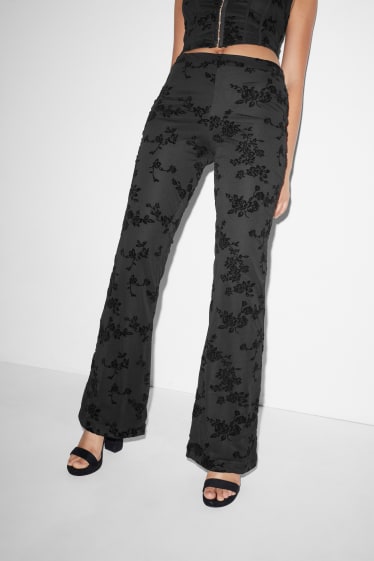 Clockhouse femme - CLOCKHOUSE - pantalon de jersey - flared - à fleurs - noir