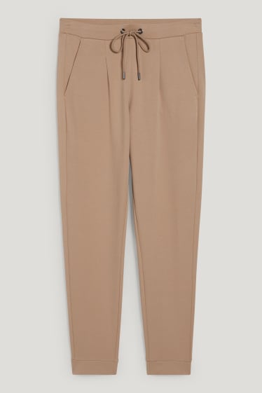 Women - Jersey trousers - tapered fit - beige