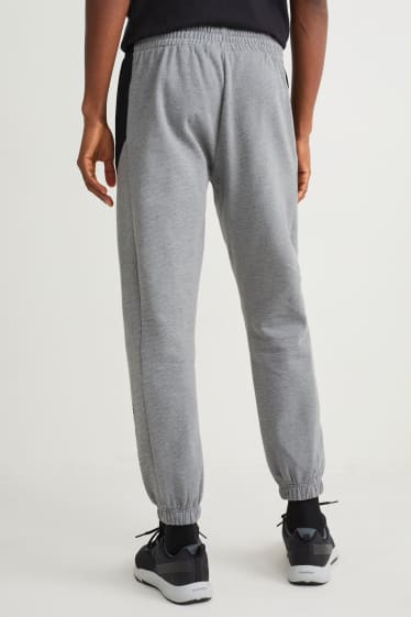 Hommes - Pantalon de jogging - gris clair chiné