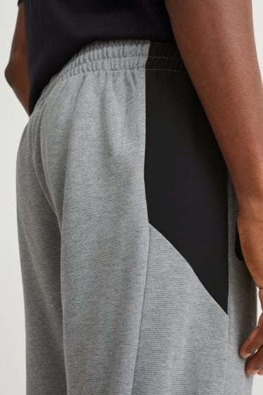 Hommes - Pantalon de jogging - gris clair chiné