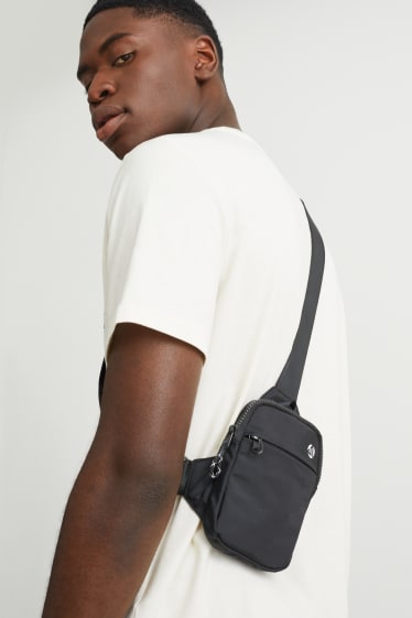 Small sports bag with shoulder strap - black