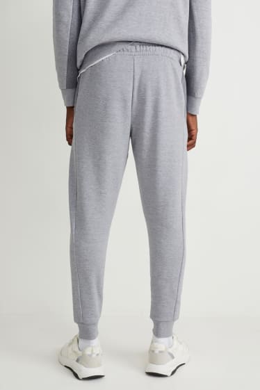 Hommes - Pantalon de jogging - gris clair chiné