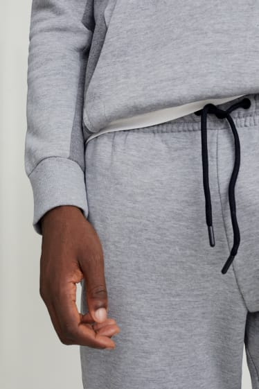 Hommes - Pantalon de jogging - gris clair chiné