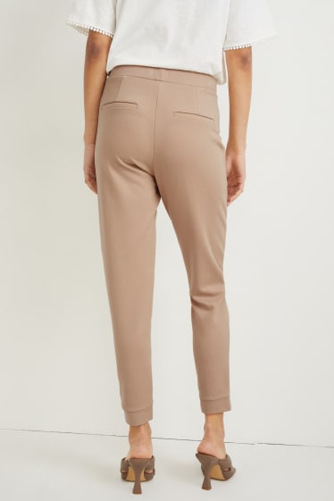 Women - Jersey trousers - tapered fit - beige