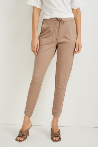 Women - Jersey trousers - tapered fit - beige