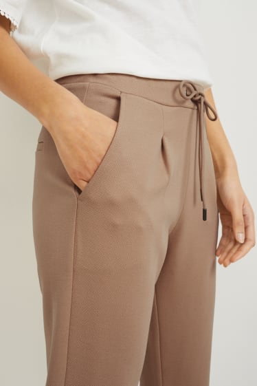 Women - Jersey trousers - tapered fit - beige